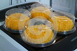 Sweet egg or fios de ovos, creamy sweet coconut cake, popular dessert in box