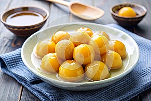 Sweet Egg Yolk Fudge Balls in Syrup photo