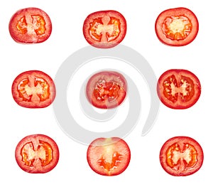 Sweet fresh ted tomato slices isolated on white background.