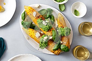 Sweet fried corn pesto sauce feta cheese white wine