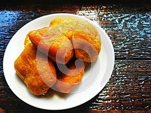 Sweet fried dough that is popular for breakfast in Thailand. photo