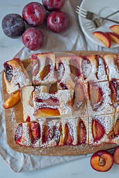 Sweet German plum cake Zwetschgenkuchen with crumbles