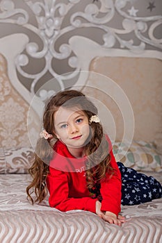 Sweet girl in pajamas getting ready for bed