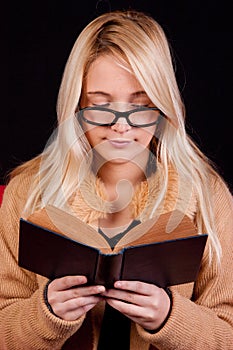 Sweet girl reading a book