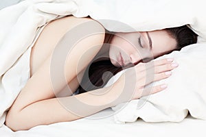 Sweet girl sleeping on bed. beautiful sensual woman