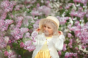 Sweet girl in spring garden