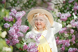 Sweet girl in spring garden