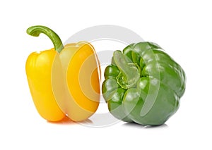 Sweet green and yellow pepper isolated on white background.