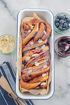 Sweet home made blueberry brioche babka on a table