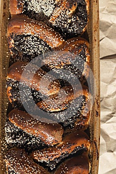 Sweet homemade bread braided with poppy seeds