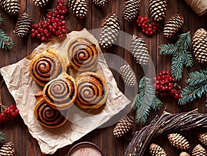 Sweet Homemade christmas baking. Cinnamon rolls buns with cocoa filling. Kanelbulle swedish dessert. Top view.