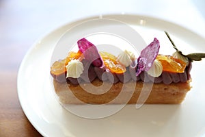 Sweet homemade fance peach cake on a plate