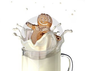 Sweet human character shaped bisquit, splashing into a glass mug. photo