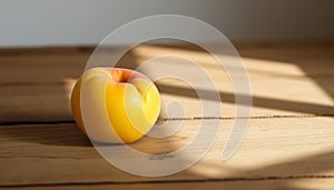Single Yellow Peach on Wood