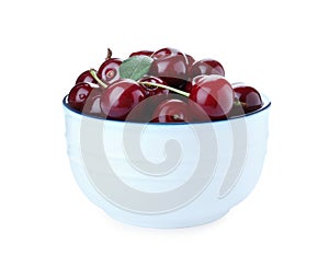Sweet juicy cherries in bowl isolated