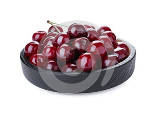 Sweet juicy cherries in bowl isolated