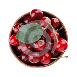 Sweet juicy cherries in bowl isolated, top view