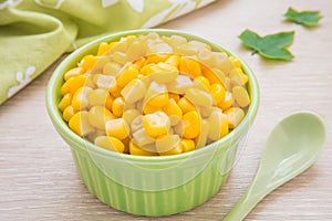 Sweet kernel corn in green bowl