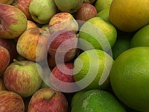 Red Yellow Apple and Green Yellow Sweet lime mosambi photo