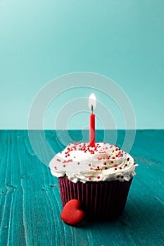 Sweet little birthday cake with candles