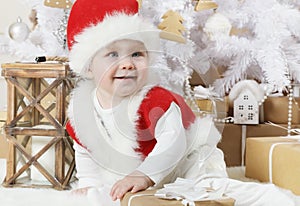 Sweet little girl dressed as Santa
