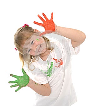 Sweet little girl showing painted hands in color
