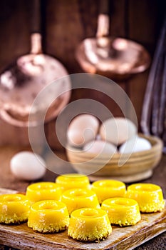 Sweet made from egg yolk, called in Brazil Quindim, and in Portugal brisa-do-Lis photo