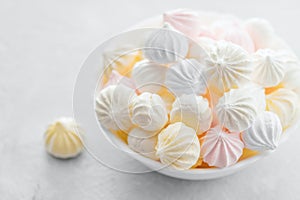 Sweet marshmallows in a cup, delicious dessert, on a white background