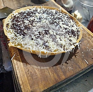 sweet martabak with chocolate and cheese topping