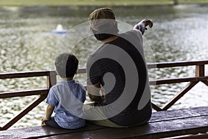 Sweet moment of a father and son bonding time at a public park