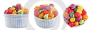 Sweet multicolor popcorn on a white isolated background