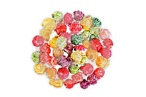 Sweet multicolor popcorn on a white isolated background