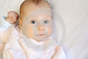 Sweet Newborn Baby Girl With Bright Blue Eyes