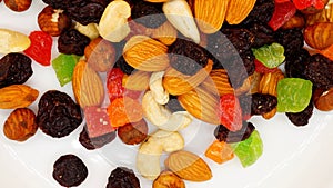 Sweet nut salad in bulk on a white background