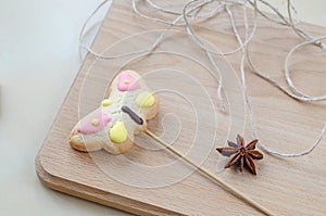 Sweet oatmeal cookies on wooden board