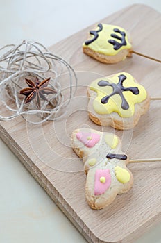 Sweet oatmeal cookies on wooden board