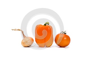 Sweet orange bell pepper, orange tomato and gold onion on a white background