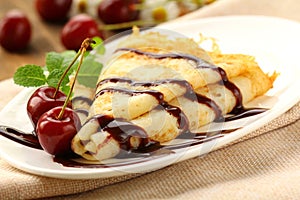 Sweet pancake with chocolate sauce