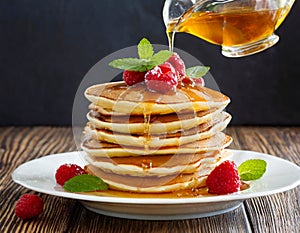 sweet pancakes syrup homemade in wooden table