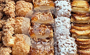 Sweet pastry, puff pastry with powdered sugar, with pine nuts, with jam made from Siam pumpkin, photo