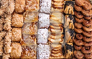 Sweet pastry, puff pastry with powdered sugar, with pine nuts, with jam made from Siam pumpkin,