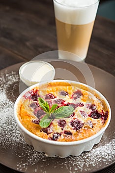 Sweet pie or casserole with cherry and green mint