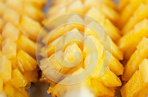 Sweet pineapple peeled and trim, ripe and succulence of pineapple flat lay on plate