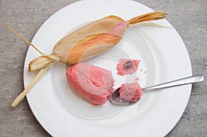 Sweet pink Mexican tamales filed corn dough, food in Mexico