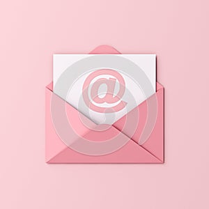 Sweet pink pastel color email or e-mail at sign in envelope on light pink background