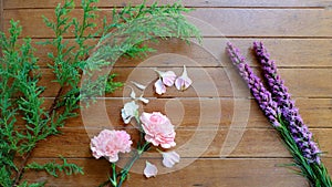 Sweet Pink and Purple flowers on wood table background