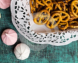 Sweet pink white marhmellows, cookies in tablecloth