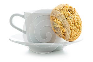 Sweet pistachio cookies and coffee mug.