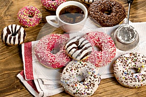 Sweet pleasure for your taste - American donut and cup of coffe