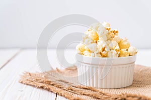 sweet popcorn on wood